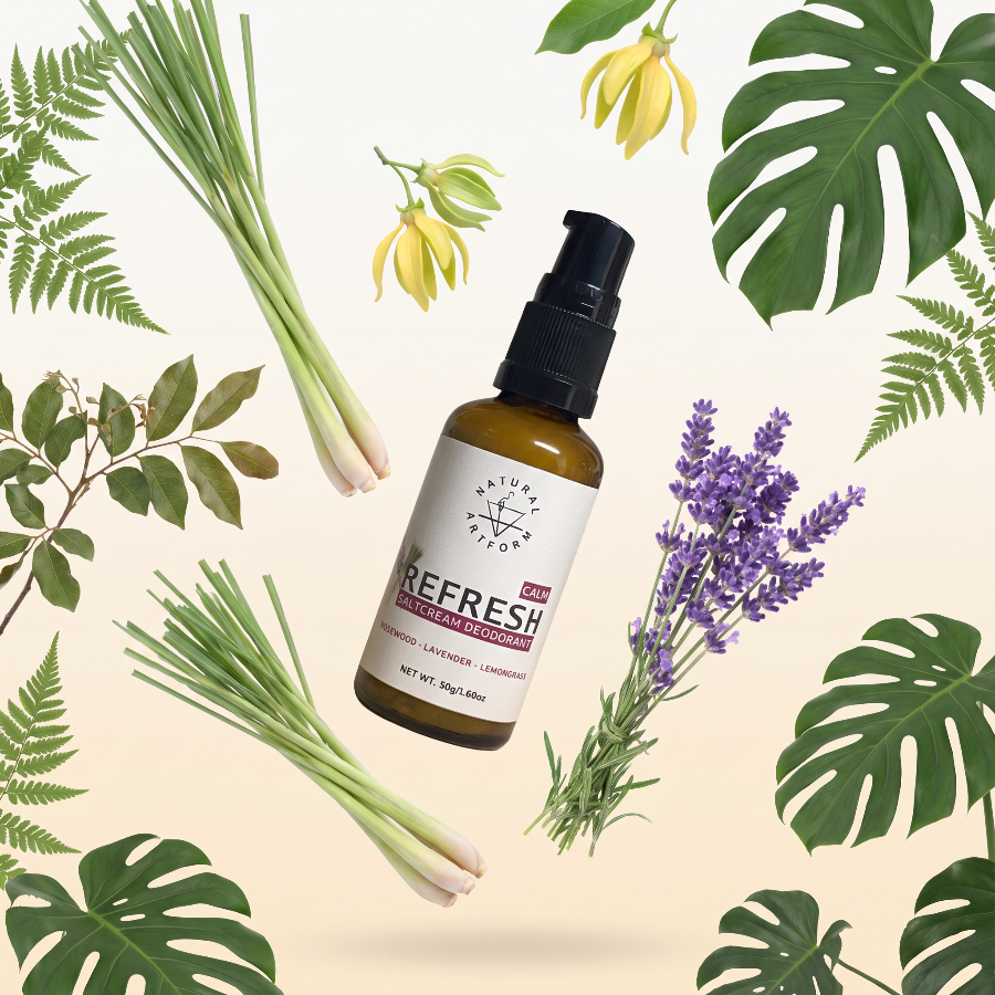 A bottle of Nature's Path Refresh Herbal Cologne floating in the center, surrounded by botanical illustrations including green monstera leaves, ferns, lemongrass, and lavender sprigs on a light cream background.